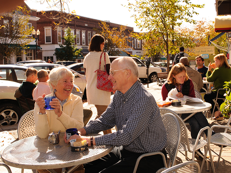 Resident couple at sidewalk cafe table in Hanover
