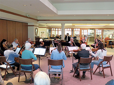Kendal at Oberlin residents and Oberlin College students playing string instruments